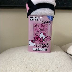 Hello Kitty bows and leopard print. Never used in original package